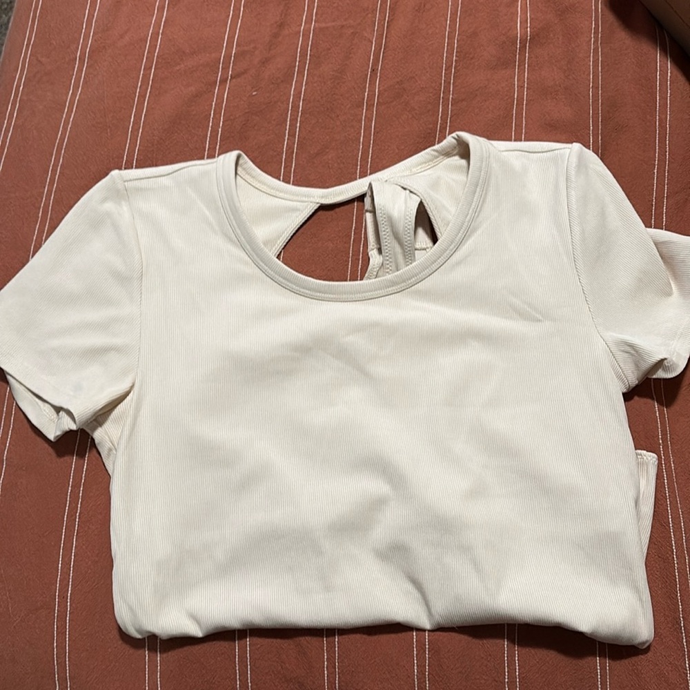 Vuori Pose Bodysuit — cream color, NWOT!